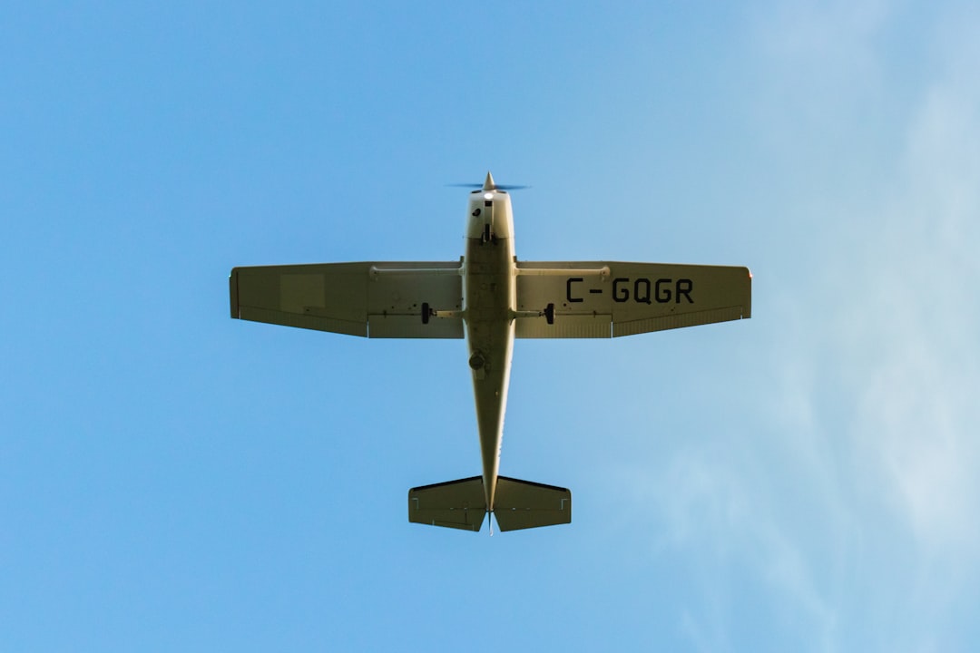black-and-white-plane-in-the-sky-lvniikyzmwo